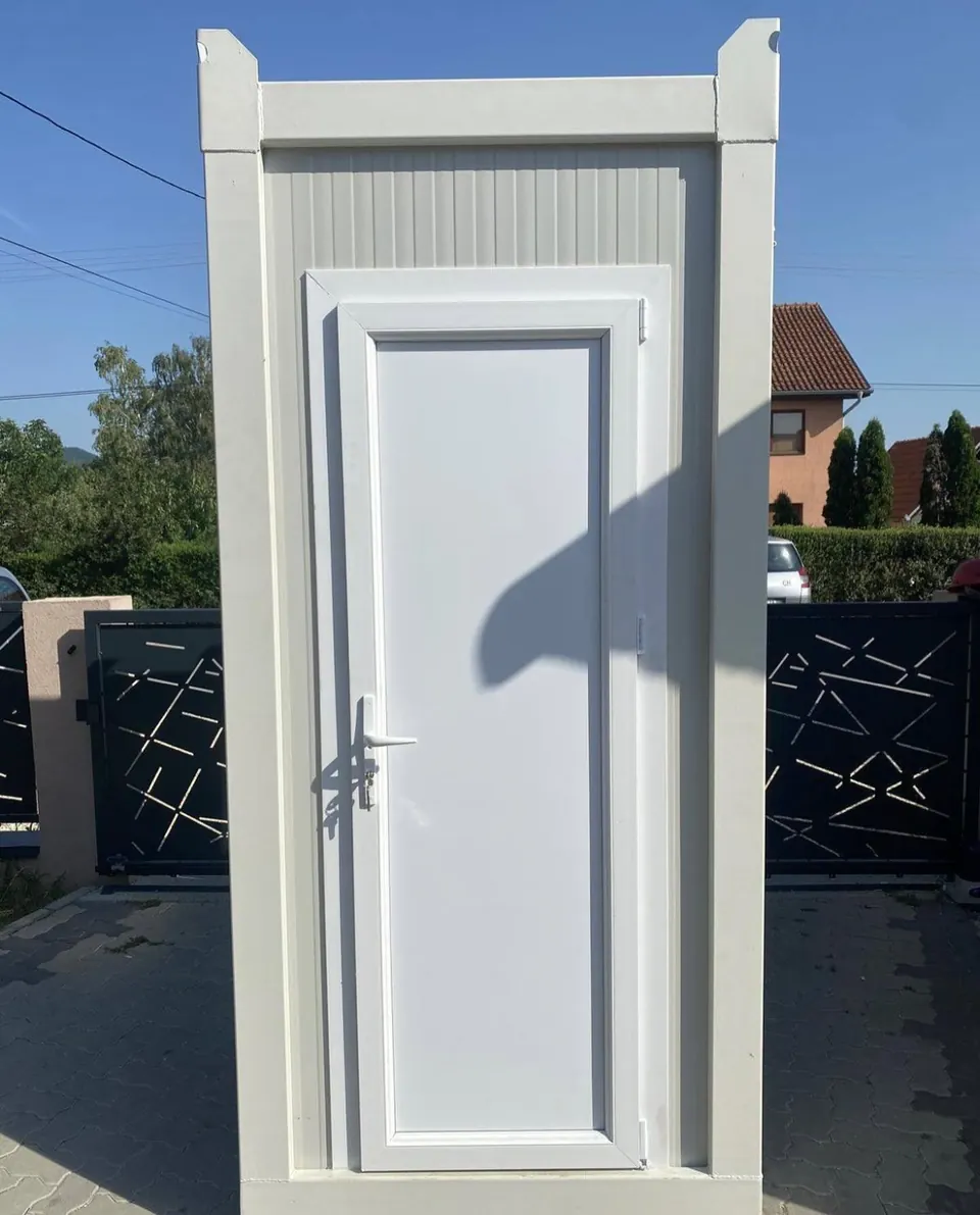 White portable restroom exterior