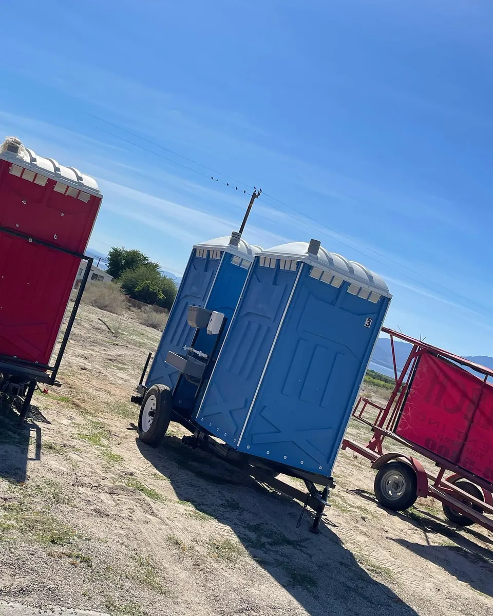 Portable toilets near a service truck